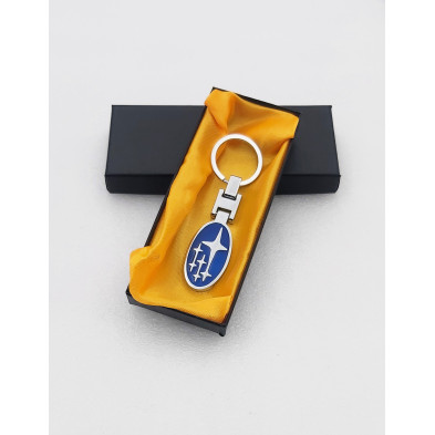 Llavero metálico subaru ovalado