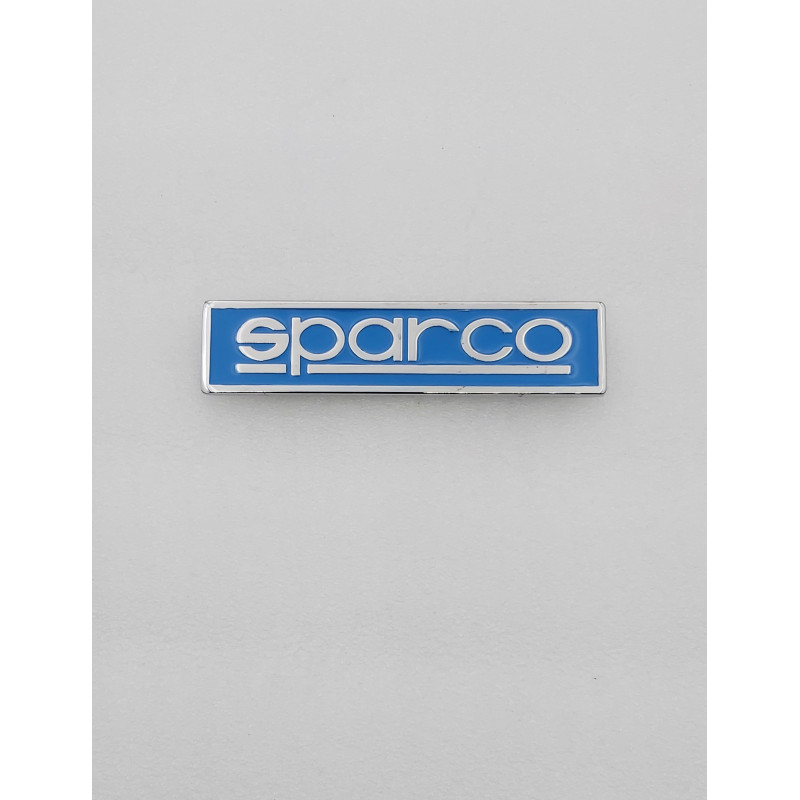 EMBLEMA DE PARRILLA SPARCO AZUL Y PLATA CROMADO