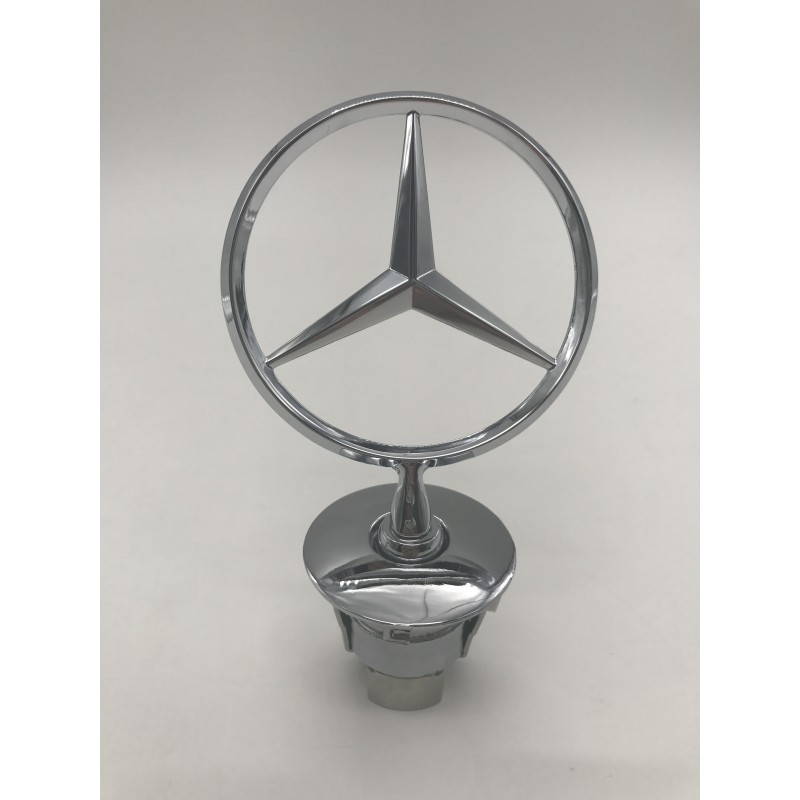 EMBLEMA CAPOT MERCEDES 202 210