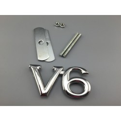 EMBLEMA DE PARRILLA V6 PLATA